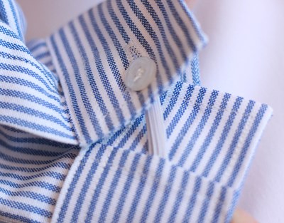 חולצה מכופתרת פסים תכלת לבן